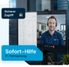 Zwei Bildschirme zeigen ein IT Monitoring Dashboard, eine Ticketübersicht und einen Mahr EDV Mitarbeiter in einer Videokonferenz als remote support